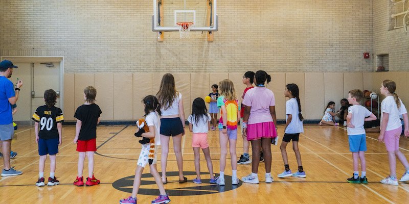 Campers gathered in the gym for an activity